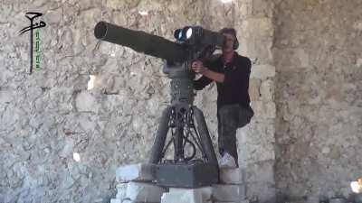 FSA BGM-71 TOW team hit an SAAF MiG on the tarmac - Aleppo - 11/7/2014
