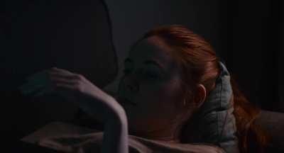 Karen Gillan getting off to some porn in Dual (2022)