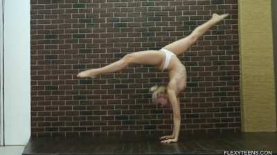 Topless Dora Tornaszkova doing walkovers forward and backward