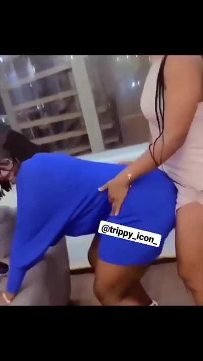 She humps her friend in the blue dress