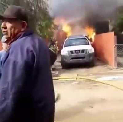 Dad runs into a burning building to save the family dog