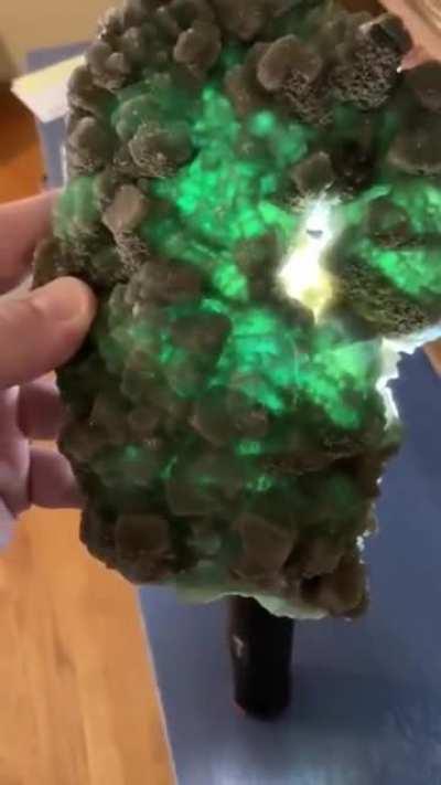 The way calcite on fluorite looks through a light source