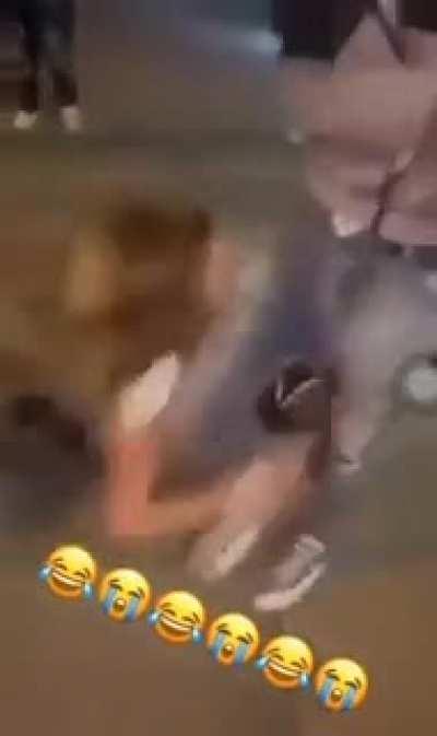 Woman tries to defend boyfriend, gets smacked.