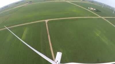 WCGW Flying through moving wind turbines with a drone