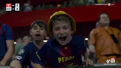 Barca kid breathing out the La Liga logo