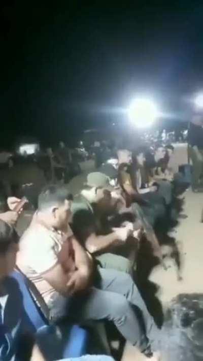 Firing bursts into the sky without knowing how to pick up an AK safely