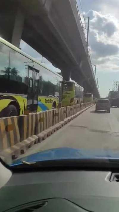 An SUV drove on the bus lane and God knows how long he'll be stuck there