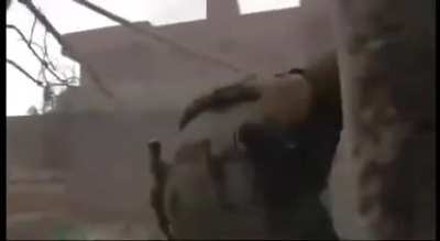 Turkish soldiers trying to extract the body of a fallen PÖH/JÖH member while fighting PKK elements in heavy urban combat, Cizre province, circa 2014.