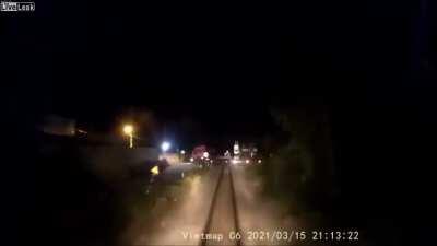 Truck bent like elastic by train