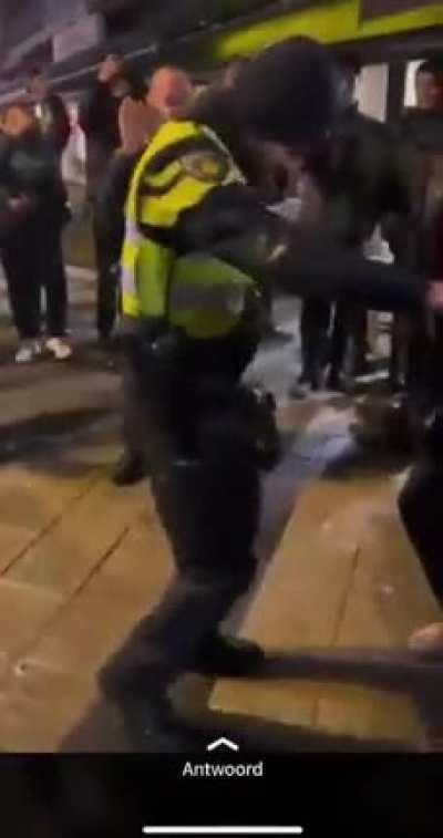 Dutch police celebrating with Moroccans the Moroccan victory against Portugal!