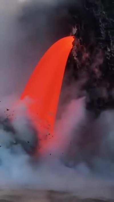 🔥 Lava flow spilling directly into the ocean