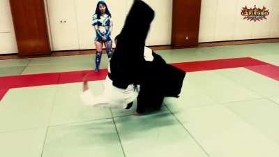 Risa Sera doing some martial arts barefoot