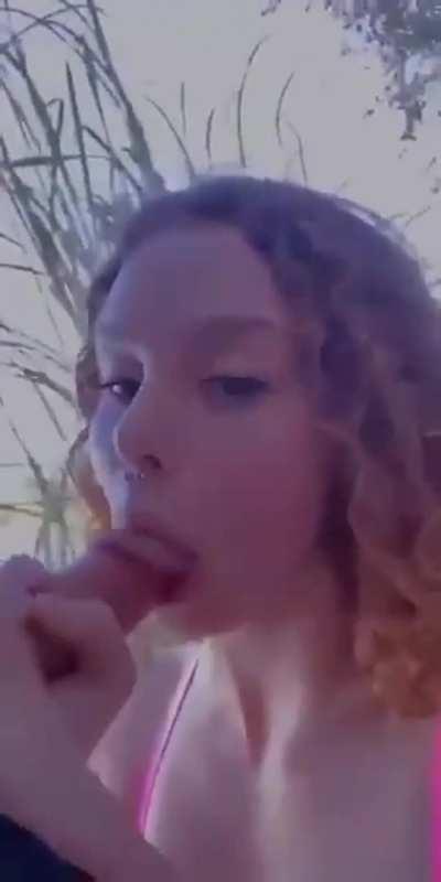 Just casually sucking cock with her friends watching