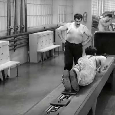 Charlie Chaplin Swallowed by a Factory Machine 1936.