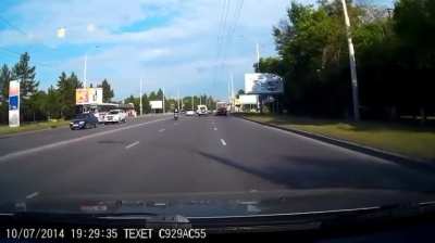Motorcycle and two cars collide in Omsk (10.07.2014)