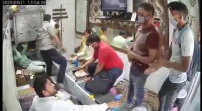 Sanitizing customer’s hands WCGW