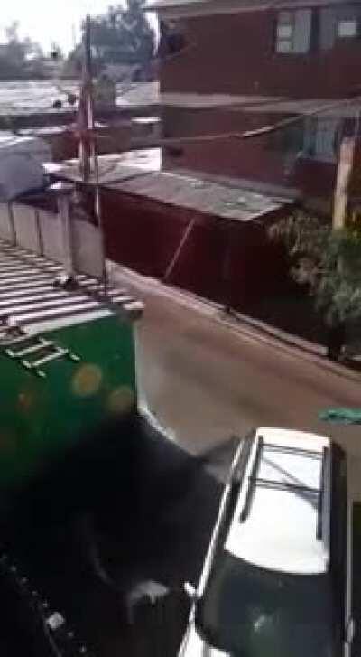 Guy shows his ass to public health workers then gets blasted by water cannon for not respecting the quarantine.