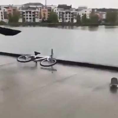 Fuck you for riding your bike in a suit with an umbrella