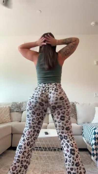 Hands behind her head 