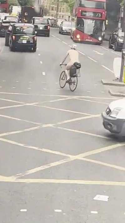 In the middle of London. Riding around naked.