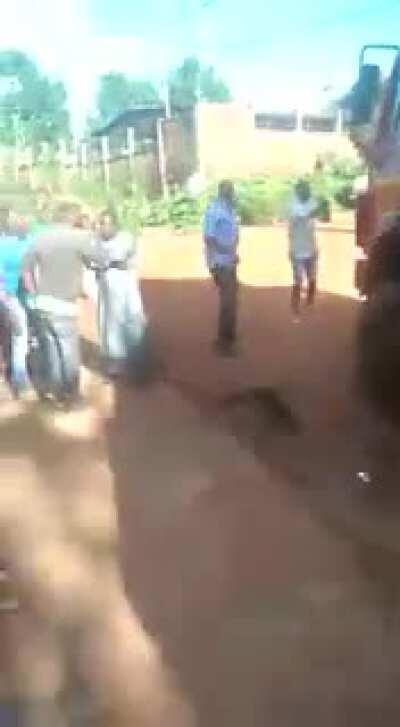 Standing Behind a Truck Offloading Stone Ballast