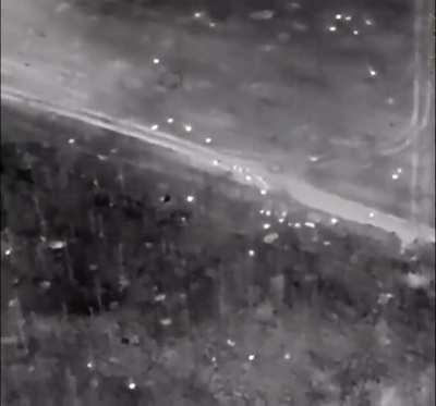Video shows cluster munitions hitting Russian infantry.