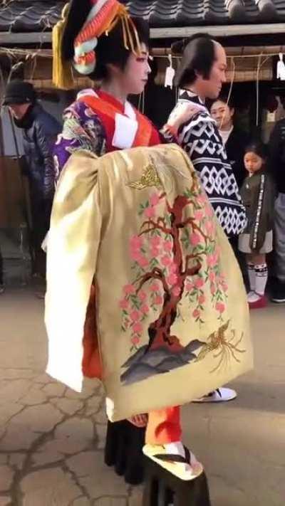 Japanese oiran walk is a slow, graceful movement typically performed in a kimono. The oiran themselves were highly trained in the art of entertainment and were considered to be the pinnacle of Japanese beauty and elegance