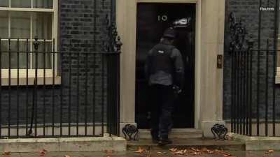 Cop Knocks on British Prime Minister's Door to Let Cat in Out of the Rain