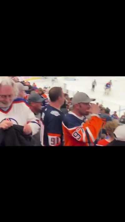 Edmonton fans throwing trash