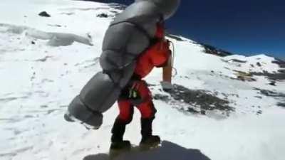 Mt. Everest guide Gelji Sherpa rescues Malaysian climber stranded at 27657 ft. (8430 m.)