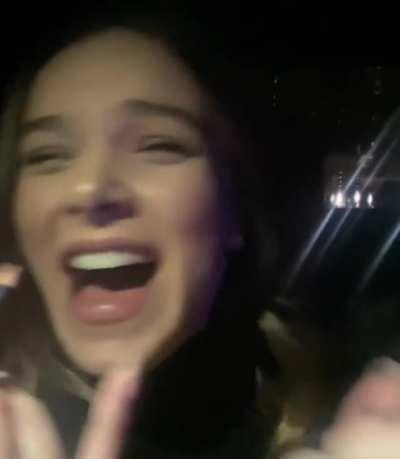 touching up her makeup