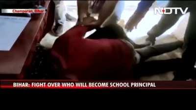 Teachers fight over who'll be the next principal...the fight is between a teacher and the husband of another teacher