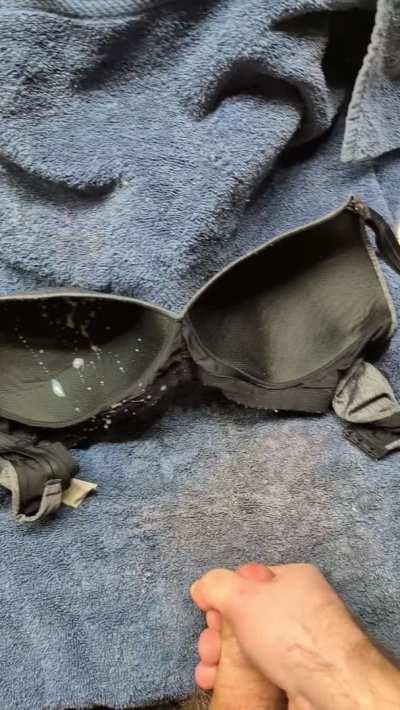 Spraying a big load on the wife's bra