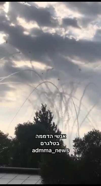 The Skies in Jerusalem filled with Trails of Smoke
