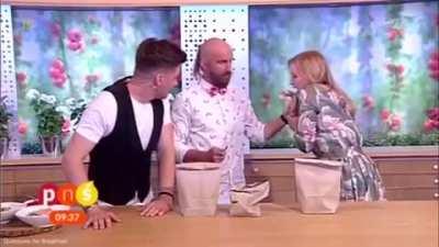 Polish magician Marcin Połoniewicz impales TV host Marzena Rogalska live on air