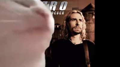 Cat vibing to Hero by Chad Kroeger