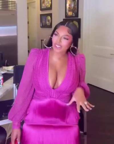 Ashanti wearing a pink dress via Instagram 11-24-24