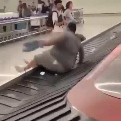 Guy gets baggage claimed