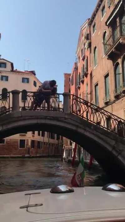 A random couple in Venice Italy saw me taking a video and decided to pose for a kiss over the bridge. Wish I could send this to them!