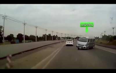 Car hits van causing the van to crash into cammer