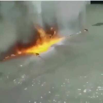 Blowing up hair spray with a firecracker