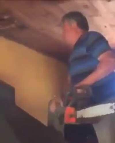 This guy using a chainsaw...