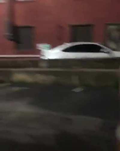 Raleigh NC Police firing at a business owner handing out water on the sidewalk.