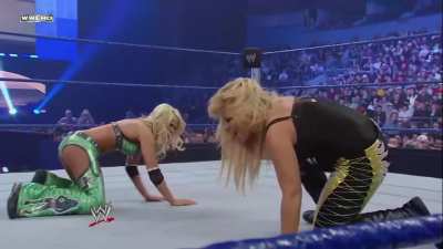 Kelly Kelly kicking Natalya around