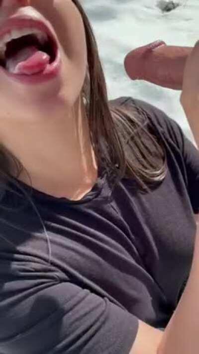 Daddy giving her daughter a drink