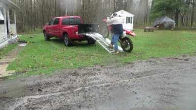 Successfully loading a motorcycle into a truck bed