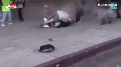 Man gets body slammed by bystander after throwing can at Police.