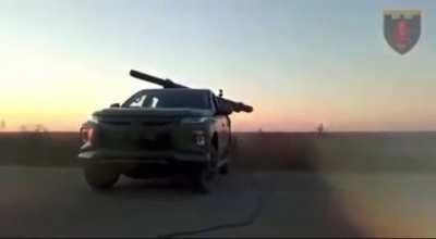 A Ukrainian pickup from the Kryvyi Rih Military Police Brigade firing Grad-P 122mm rockets