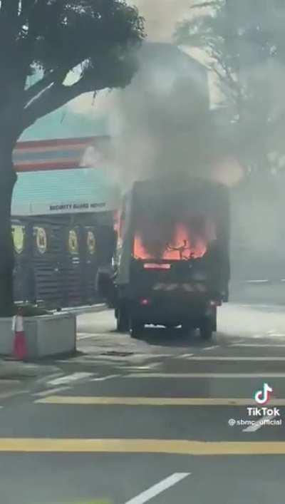 Not forgetting to give a signal even when the truck is obviously burning.
