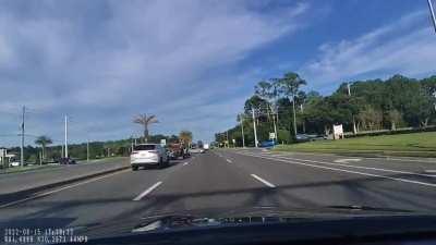 Idiot turns left without looking
